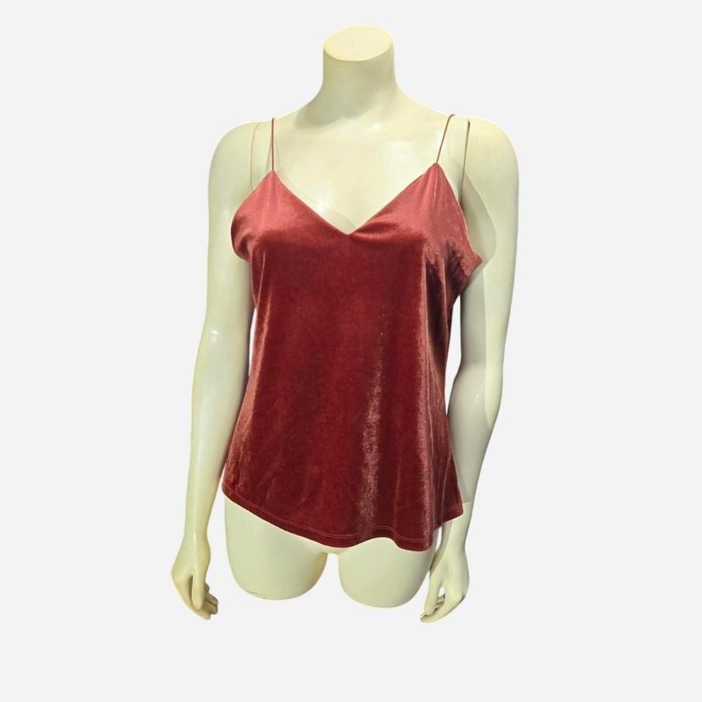 Tank top is a sleeveless camisole style with thin‎ straps and a lace pattern
